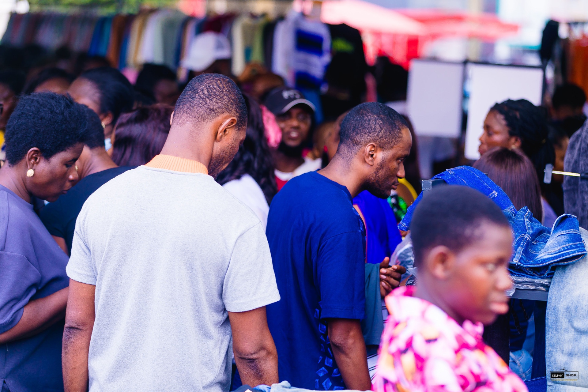 Crowds browsing clothing rails at Kelphy Sales Fest